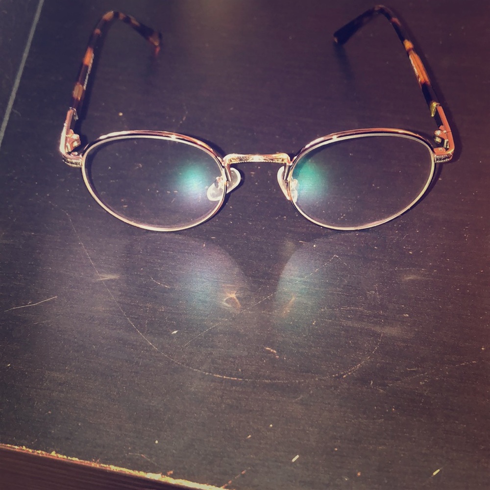 Gold oval frames with leopard colored ear grips!